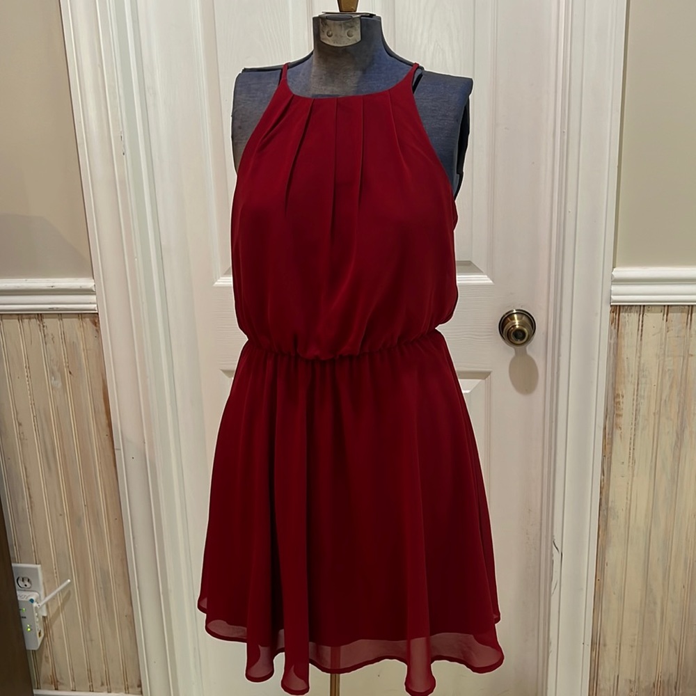 Pretty burgundy dress with same color lining.